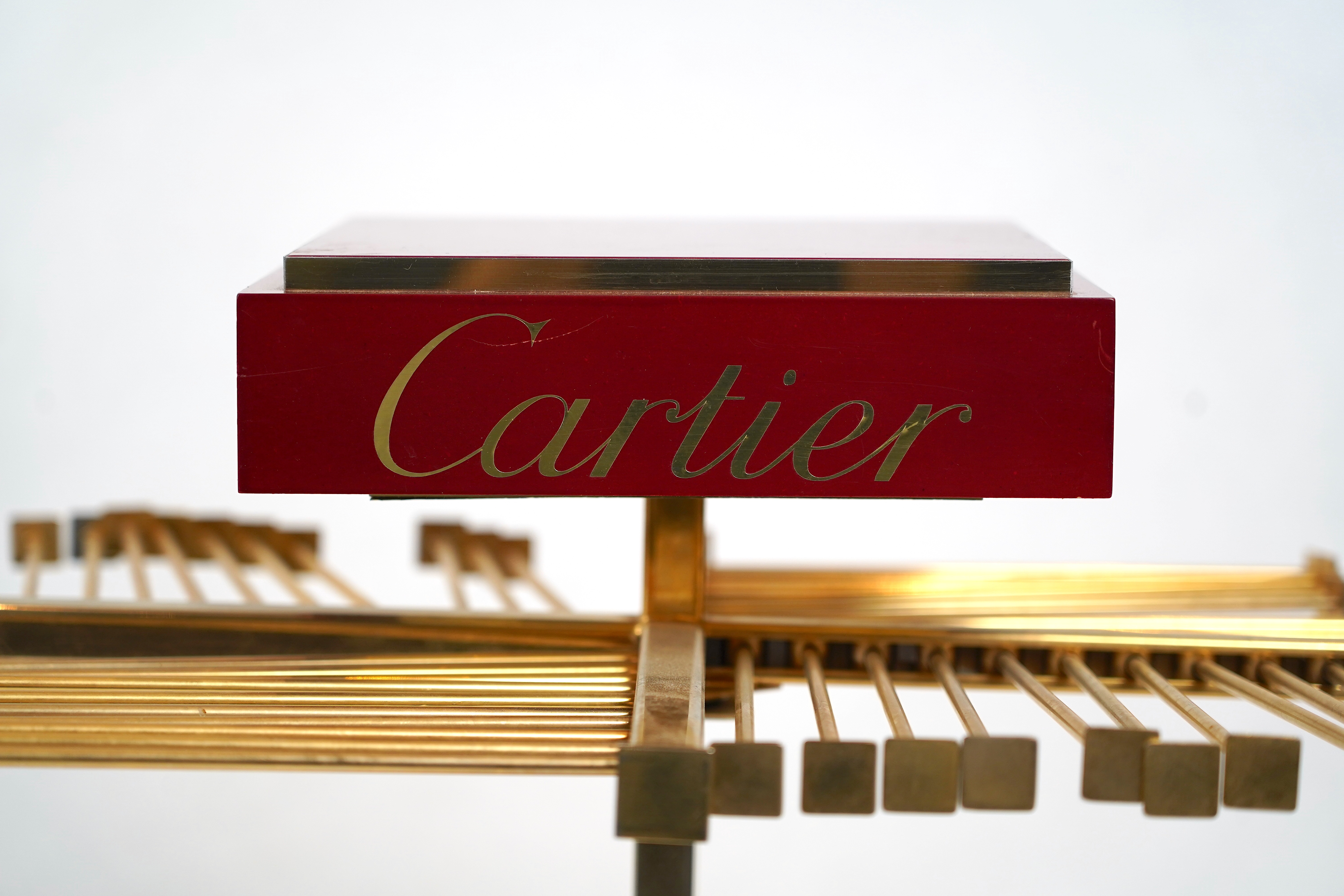 A Cartier vintage scarf rack.
